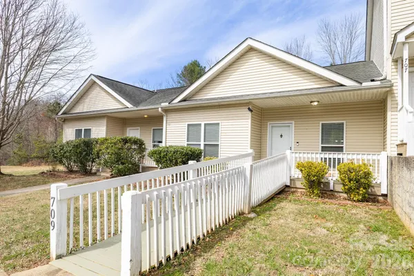 a front view of a house with a porch