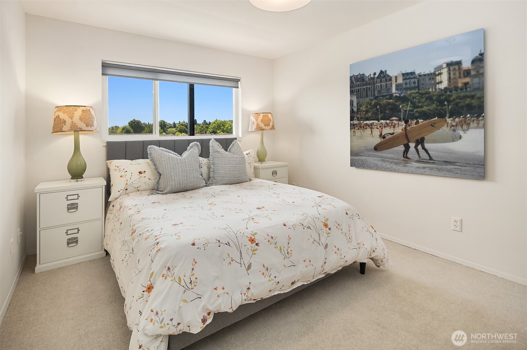 2500 Canterbury Lane East, Unit 302 Seattle, WA 98112 - Photo 12 of 33 a bedroom with a bed and a painting on the wall