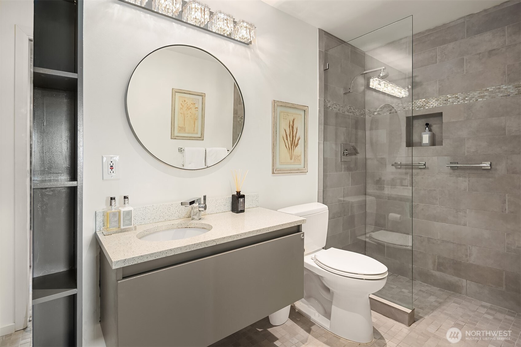 2500 Canterbury Lane East, Unit 302 Seattle, WA 98112 - Photo 14 of 33 a bathroom with a toilet a sink and a mirror