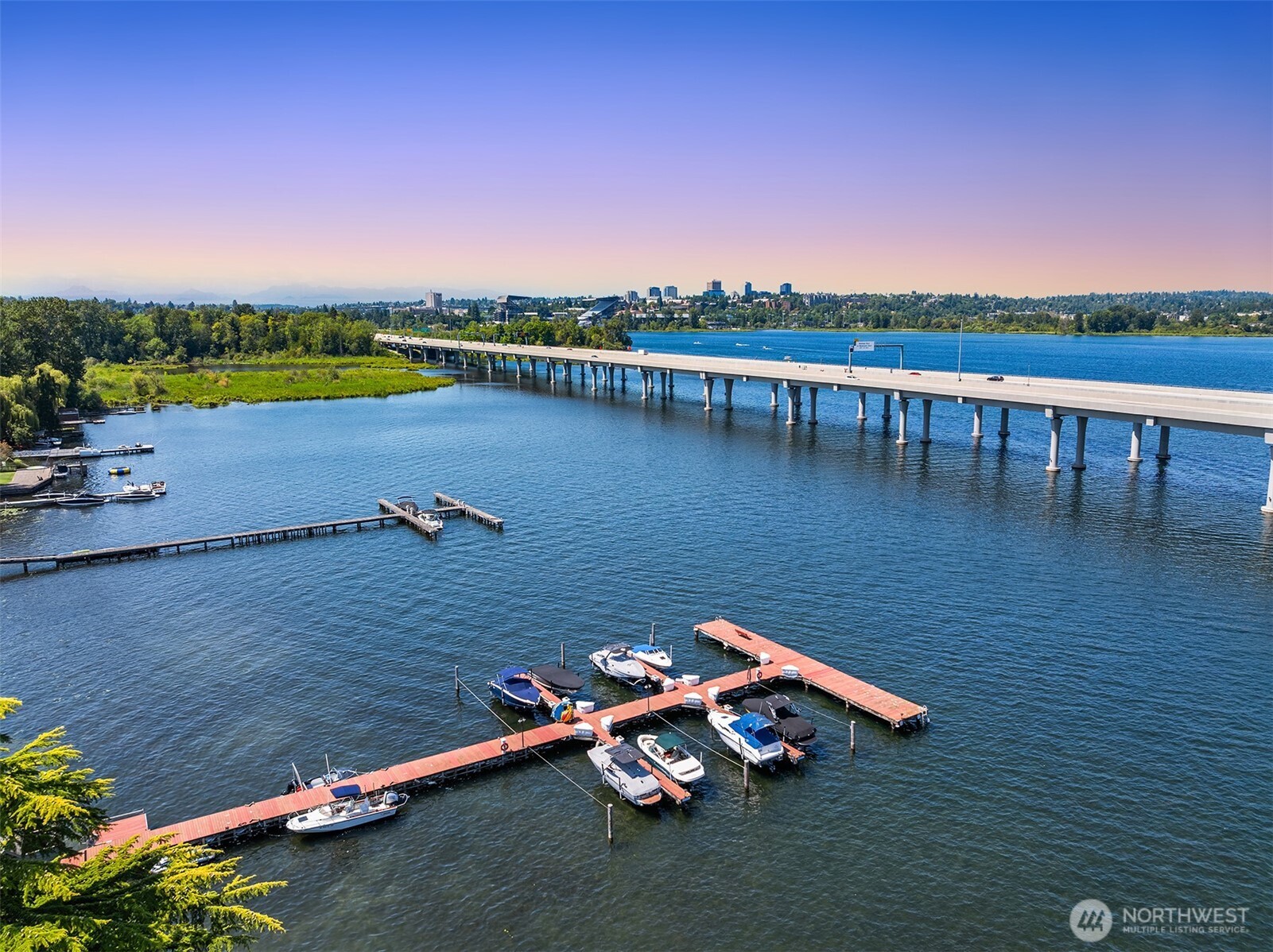 2500 Canterbury Lane East, Unit 302 Seattle, WA 98112 - Photo 17 of 33 a view of a lake with houses in the back