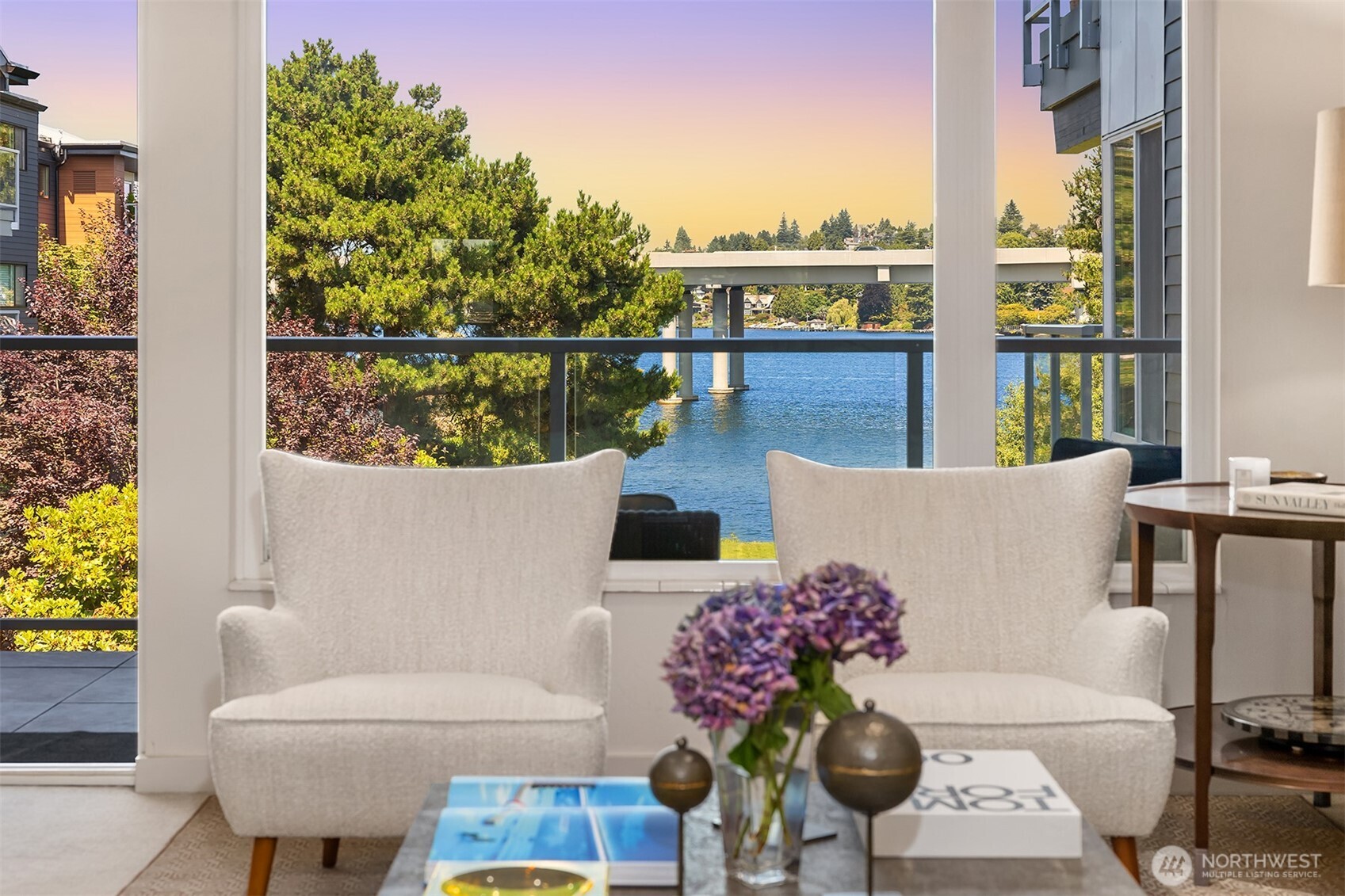 2500 Canterbury Lane East, Unit 302 Seattle, WA 98112 - Photo 22 of 33 a view of a chairs and table on the terrace