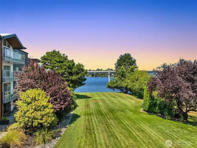 a view of a lake with a building in the background