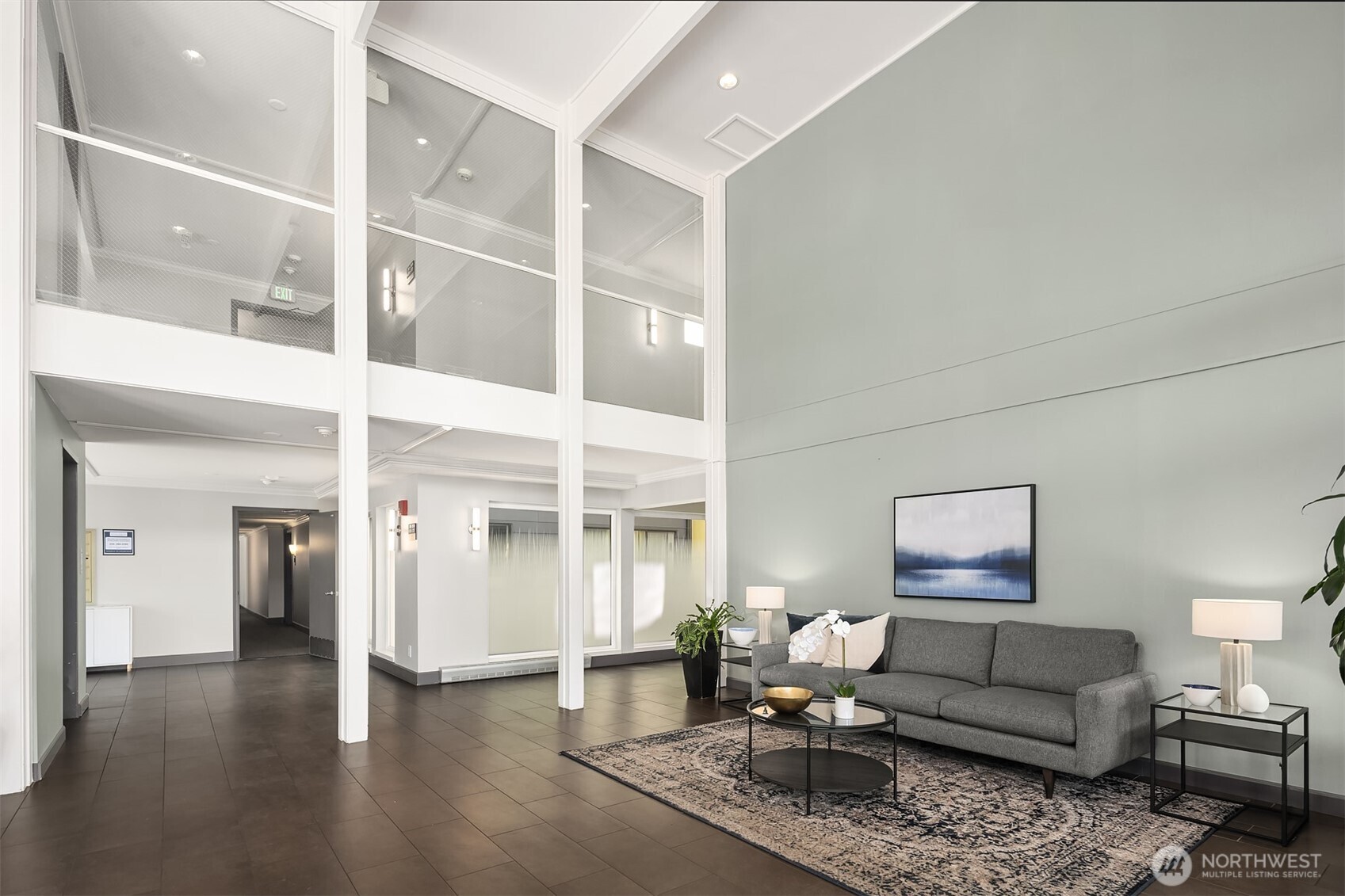 2500 Canterbury Lane East, Unit 302 Seattle, WA 98112 - Photo 29 of 33 a living room with furniture and wooden floor