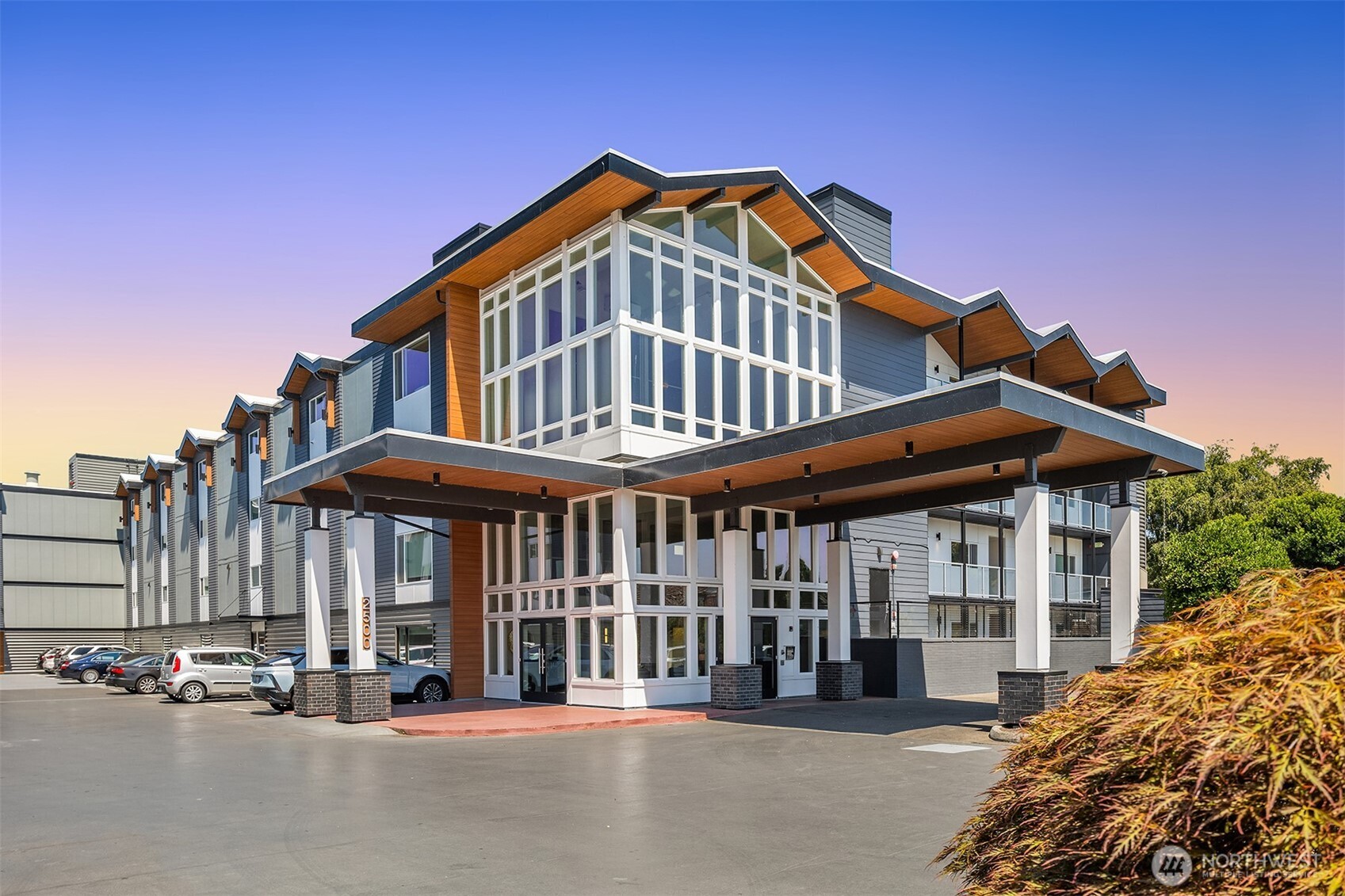 2500 Canterbury Lane East, Unit 302 Seattle, WA 98112 - Photo 30 of 33 a front view of a house with a yard