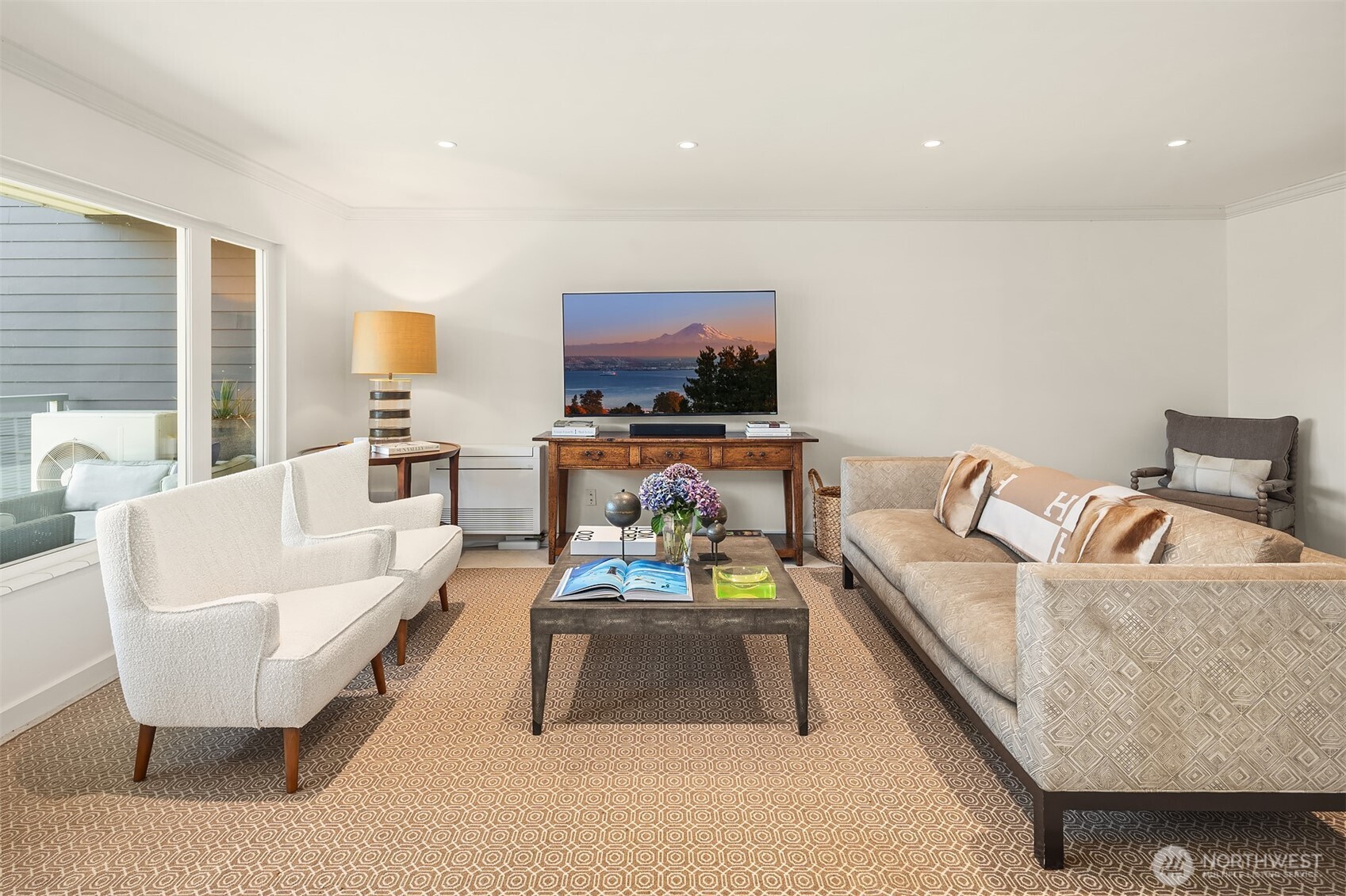 2500 Canterbury Lane East, Unit 302 Seattle, WA 98112 - Photo 5 of 33 a living room with furniture and a flat screen tv