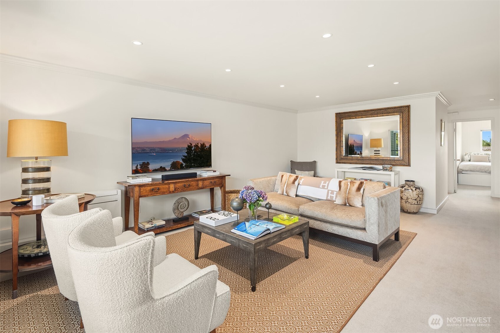 2500 Canterbury Lane East, Unit 302 Seattle, WA 98112 - Photo 6 of 33 a living room with furniture and a flat screen tv