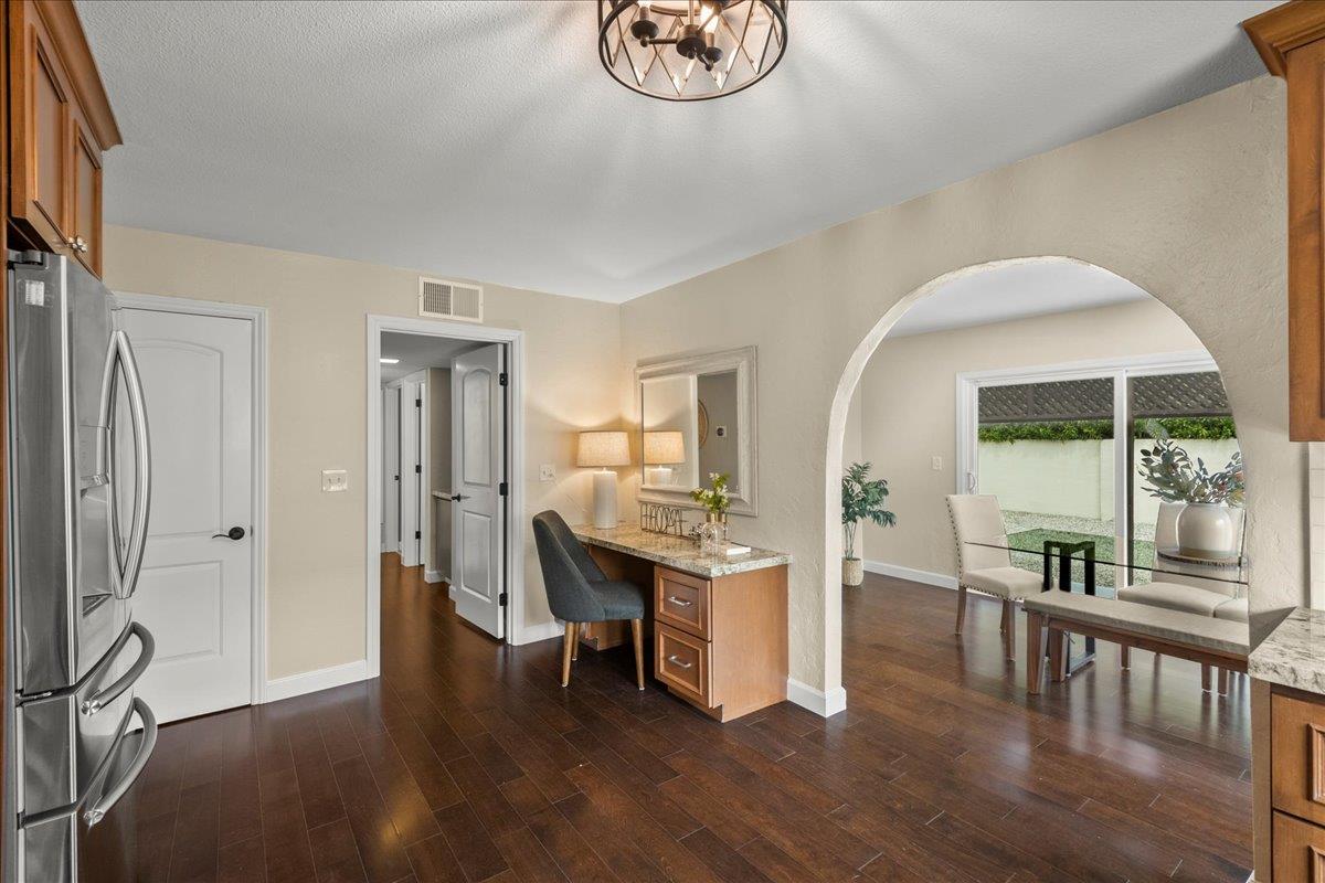 4118 Rosenbaum Avenue San Jose, CA 95136 - Photo 13 of 55 a view of a dining room with furniture window and wooden floor