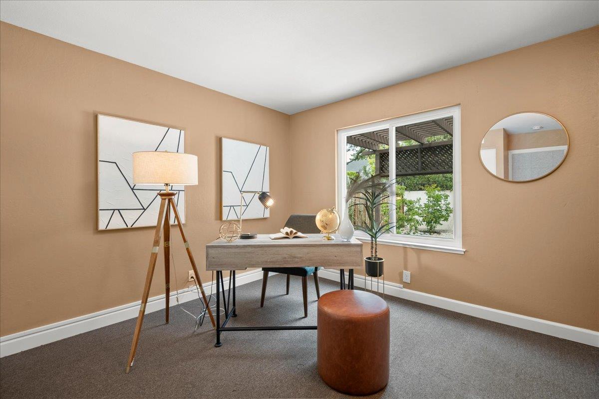 4118 Rosenbaum Avenue San Jose, CA 95136 - Photo 18 of 55 a view of a workspace with furniture and a window