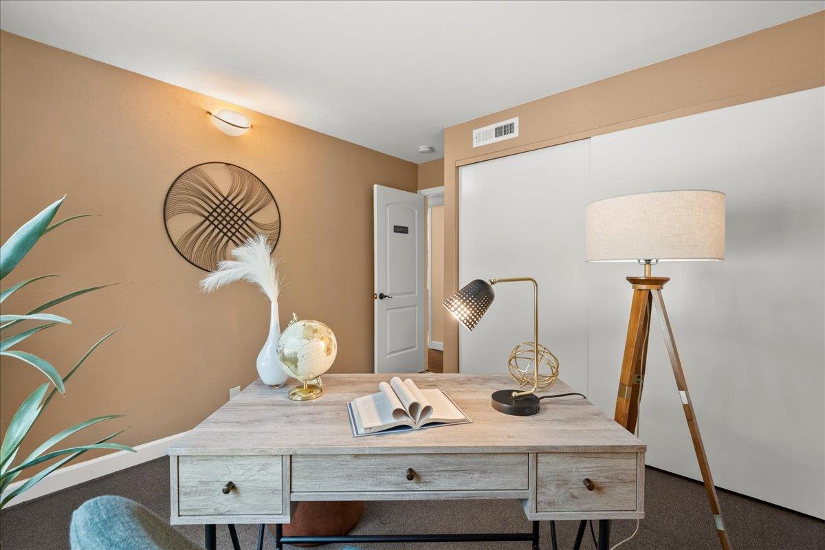 4118 Rosenbaum Avenue San Jose, CA 95136 - Photo 19 of 55 a view of bathroom with a sink and a mirror