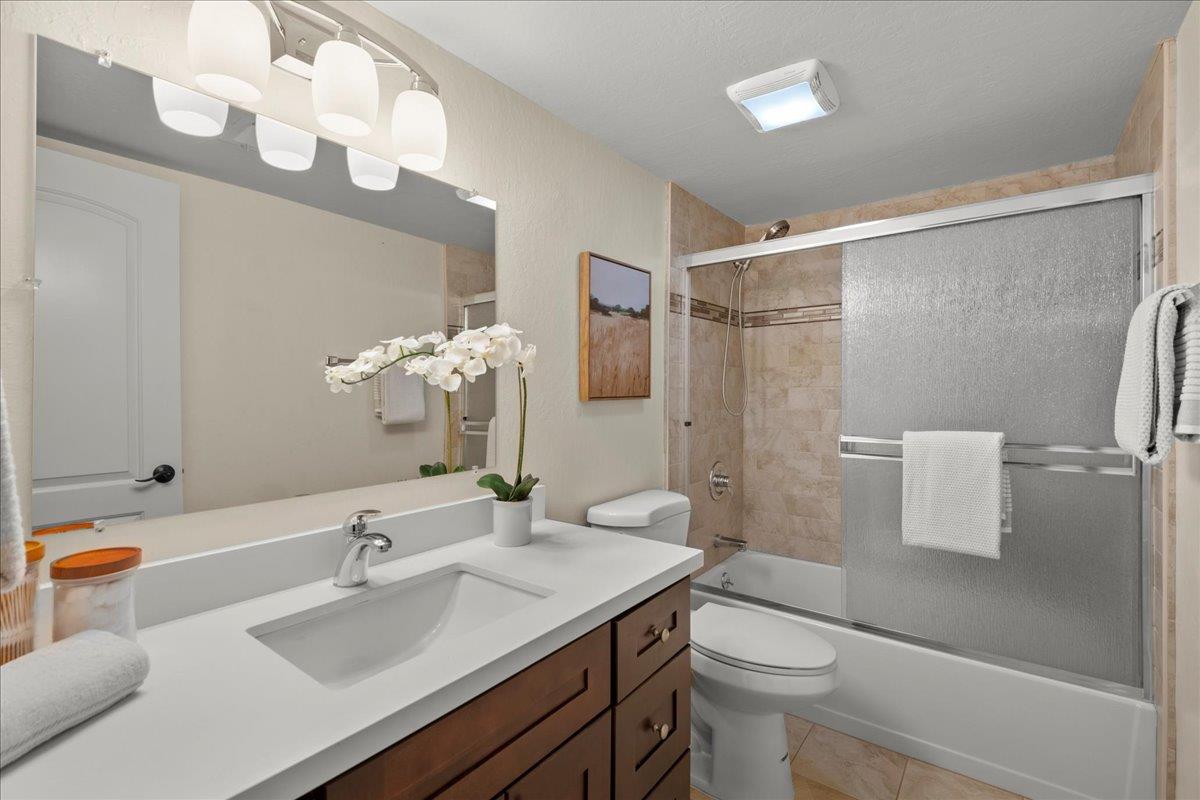 4118 Rosenbaum Avenue San Jose, CA 95136 - Photo 20 of 55 a bathroom with a sink a toilet and shower
