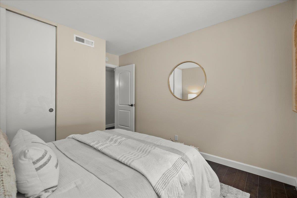 4118 Rosenbaum Avenue San Jose, CA 95136 - Photo 22 of 55 a bedroom with a bed and a mirror