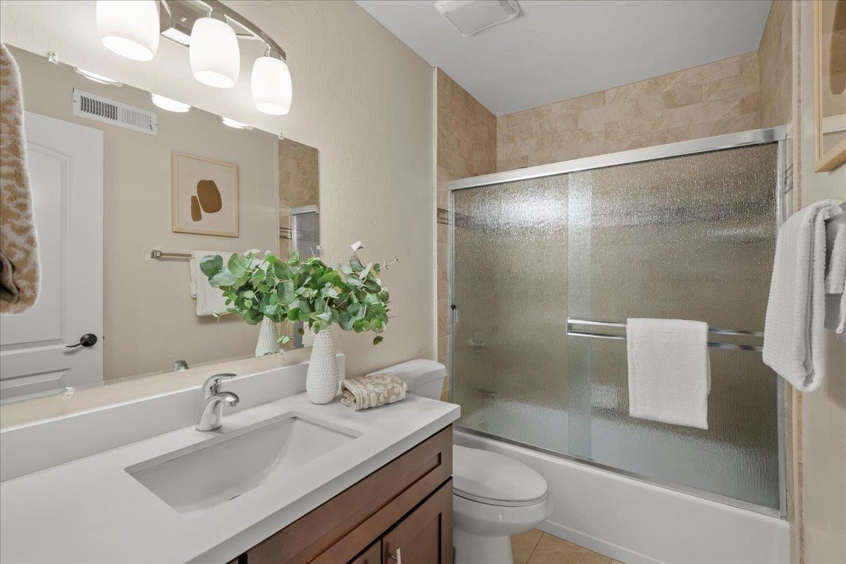 4118 Rosenbaum Avenue San Jose, CA 95136 - Photo 28 of 55 a bathroom with a sink a toilet and shower