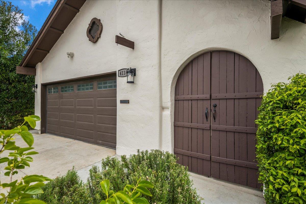 4118 Rosenbaum Avenue San Jose, CA 95136 - Photo 3 of 55 a front view of a house with a garage