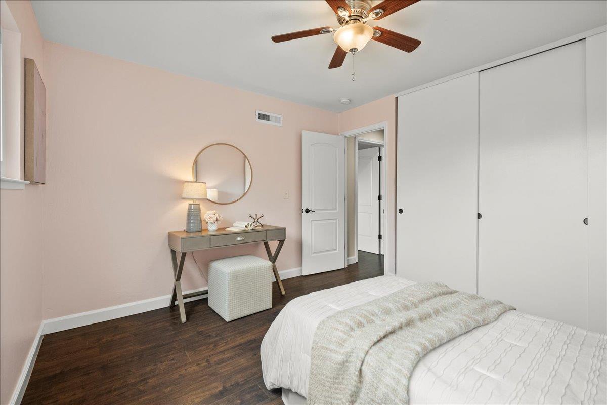 4118 Rosenbaum Avenue San Jose, CA 95136 - Photo 31 of 55 a bedroom with a bed and a chandelier