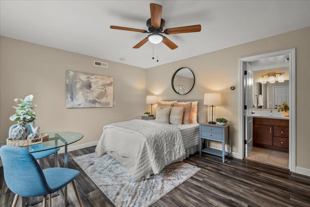 4118 Rosenbaum Avenue San Jose, CA 95136 - Photo 38 of 55 a bedroom with a bed and a chandelier