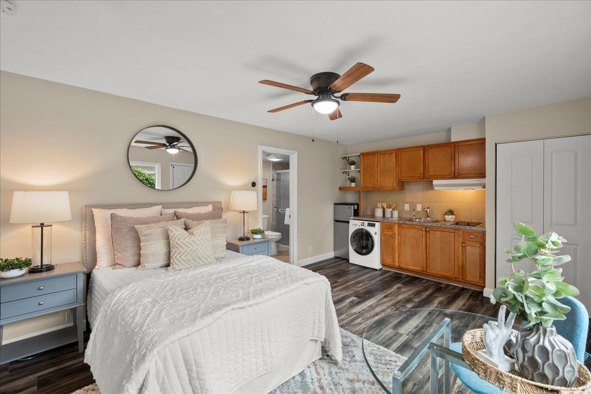 4118 Rosenbaum Avenue San Jose, CA 95136 - Photo 40 of 55 a bedroom with a bed and a chandelier