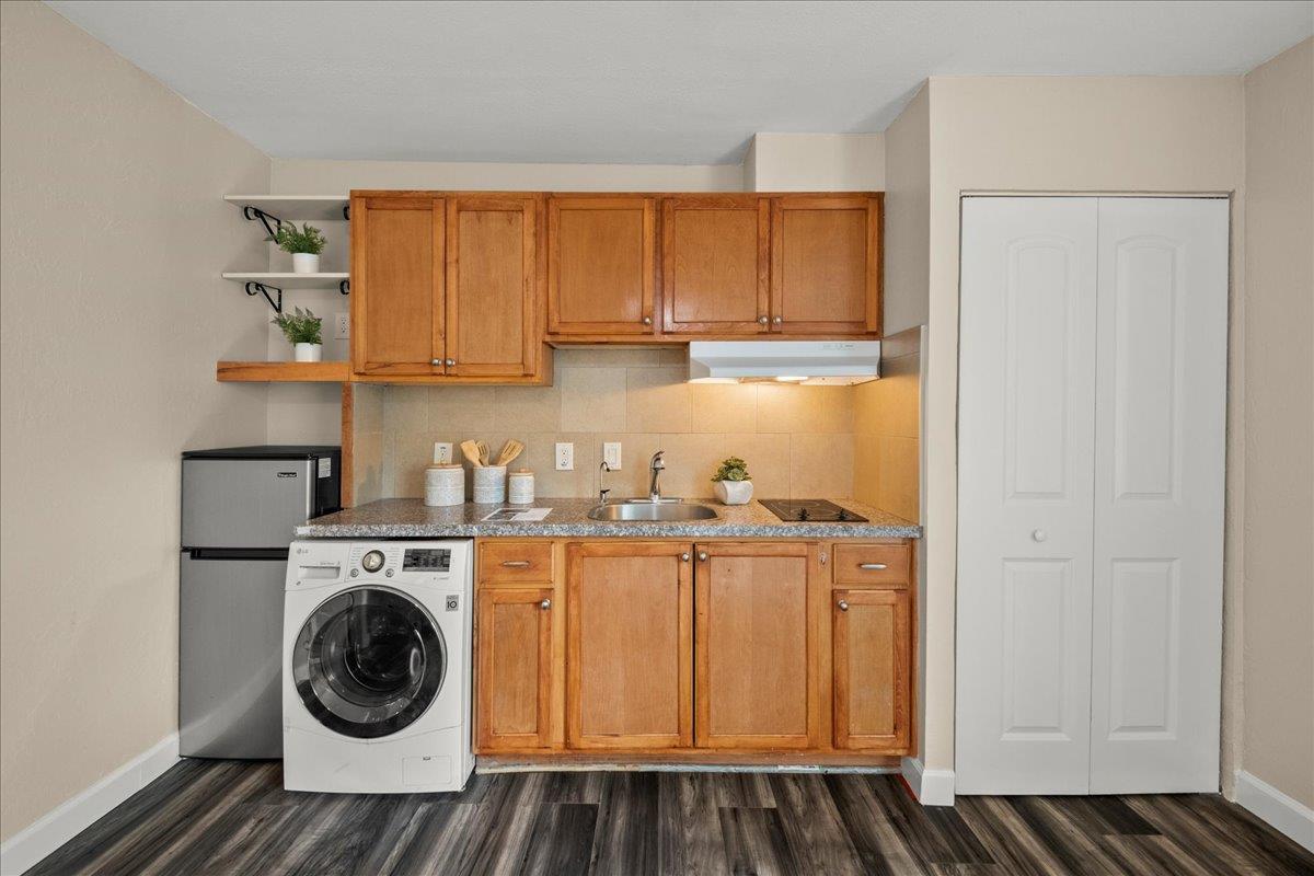 4118 Rosenbaum Avenue San Jose, CA 95136 - Photo 41 of 55 a kitchen with a refrigerator and cabinets