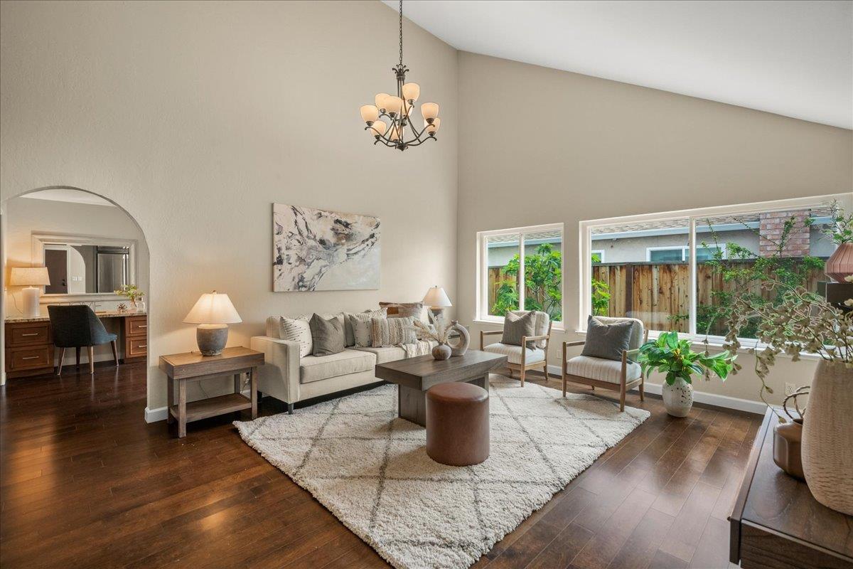 4118 Rosenbaum Avenue San Jose, CA 95136 - Photo 10 of 55 a living room with furniture potted plant and a large window