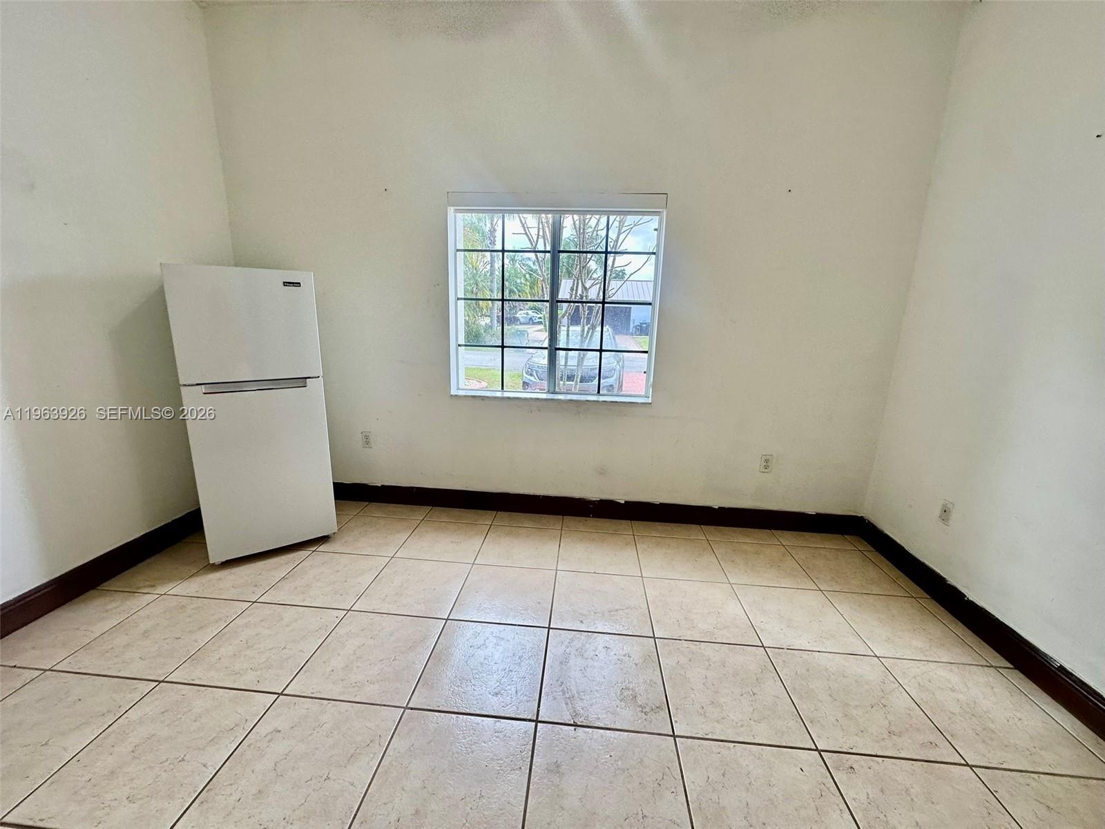 21731 Southwest 127th Court Miami, FL 33170 - Photo 9 of 10 a view of a utility room with a window