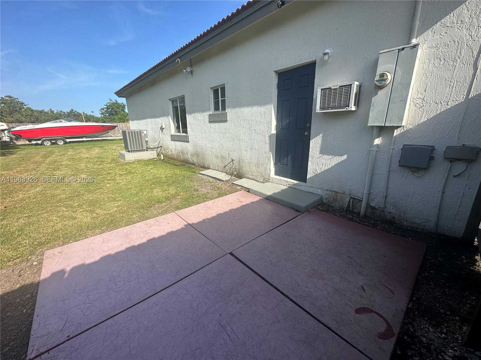 21731 Southwest 127th Court Miami, FL 33170 - Photo 10 of 10 a house with garden in front of it