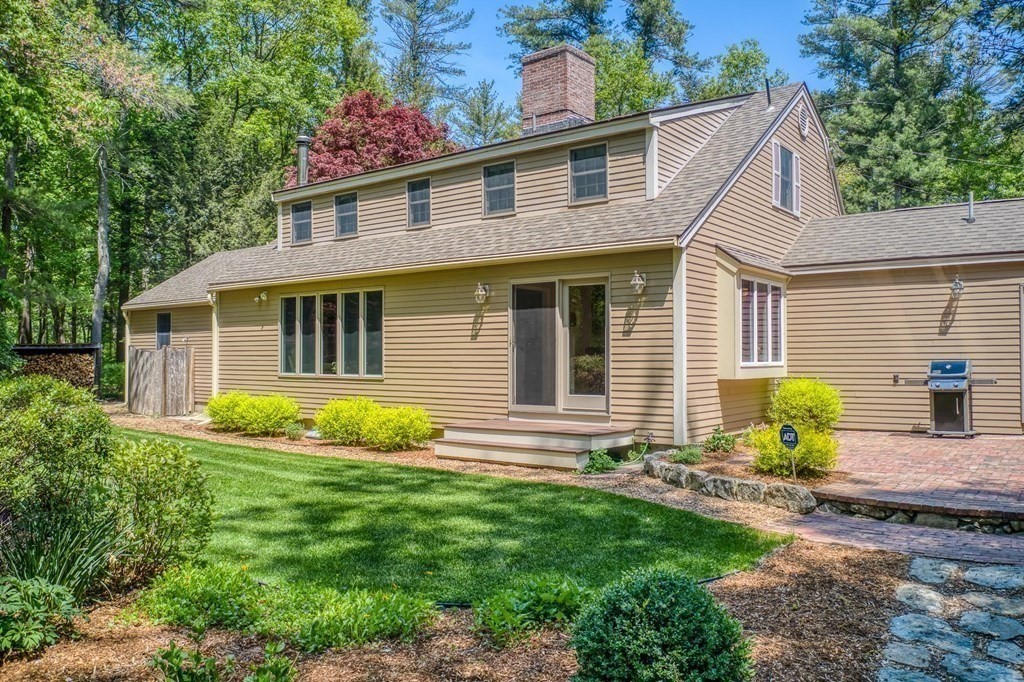 51 Towne Road Boxford, MA 01921 - Photo 34 of 39 a front view of house with yard and outdoor seating