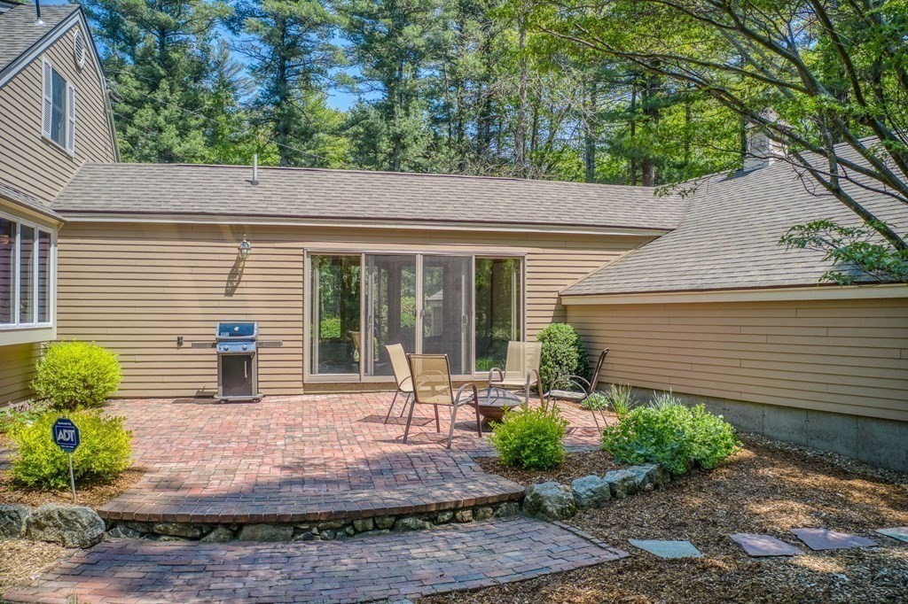 51 Towne Road Boxford, MA 01921 - Photo 35 of 39 a front view of a house with garden