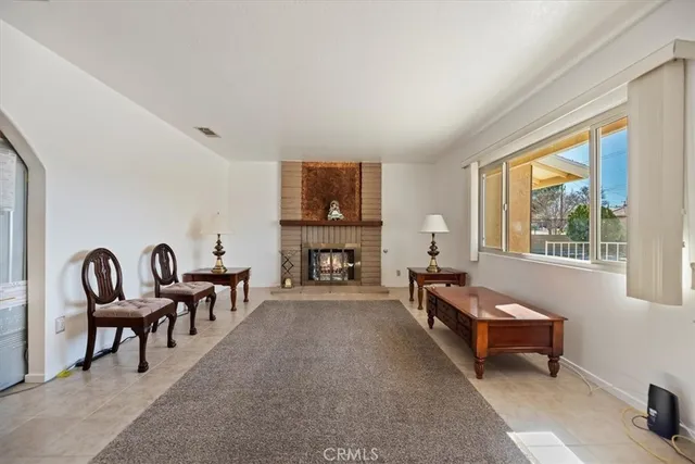 a kitchen with stainless steel appliances granite countertop a sink and dishwasher a stove top oven with wooden floor