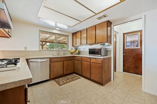 a room with a bed and a window