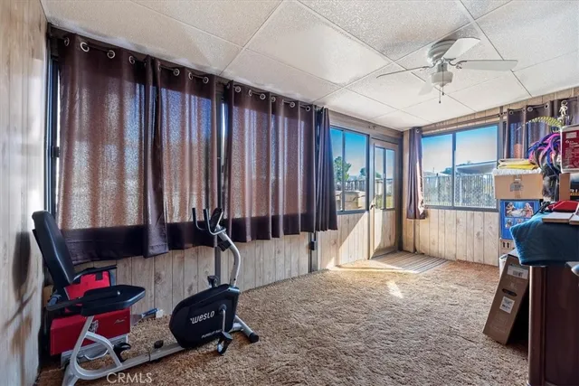 a bed room with a bed and a night stand