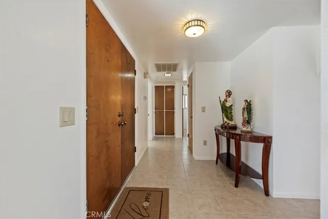 a view of a balcony with chairs