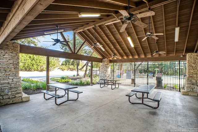 a view of a chairs and table in a room