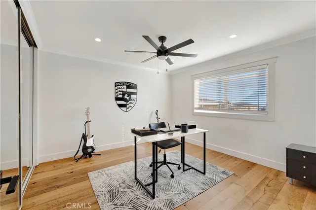 a view of a livingroom with furniture and a potted plant