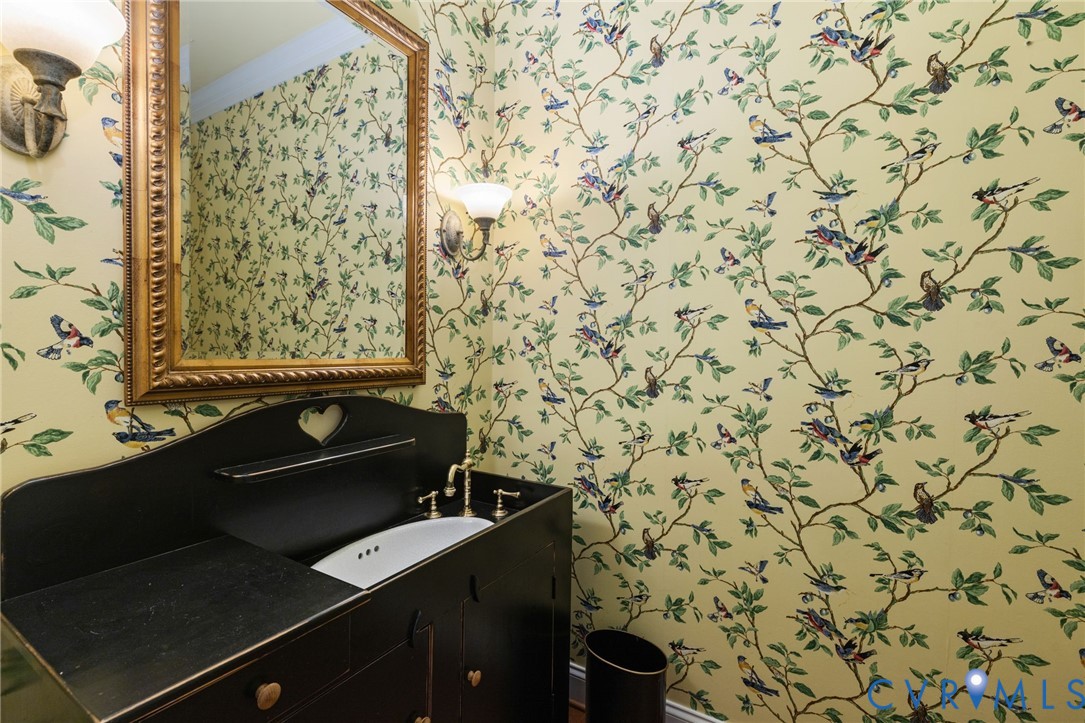 2365 State Rte 635 Midlothian, VA 23113 - Photo 15 of 64 Black vanity with integrated sink, brass-finish fa