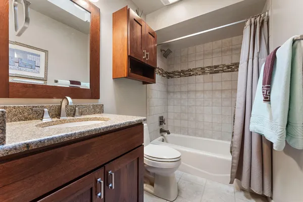 a view of a chairs and table on the wooden floor