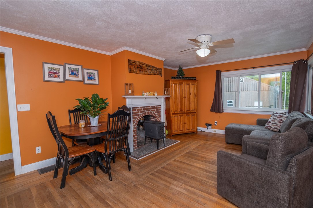 198 Carpenter Road Scituate, RI 02825 - Photo 4 of 27 Living/Dining Room With Fireplace/Wood Stove Insert