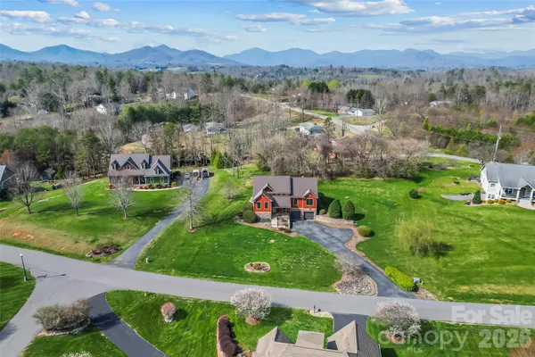 an aerial view of a house with garden