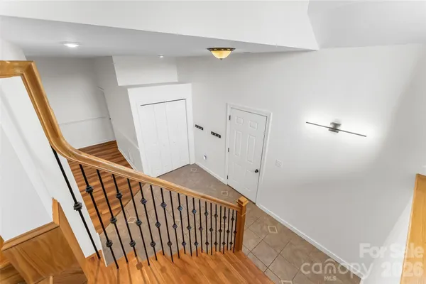a view of a hallway with staircase
