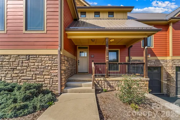 a view of a house with sitting area
