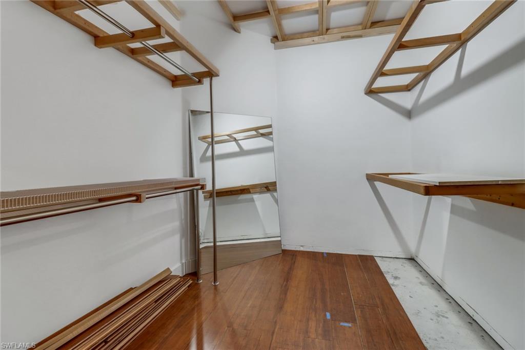 481 Raven Way Naples, FL 34110 - Photo 16 of 30 a view of entryway with wooden floor