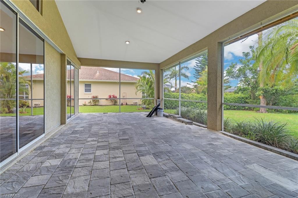 481 Raven Way Naples, FL 34110 - Photo 25 of 30 a view of outdoor space and porch