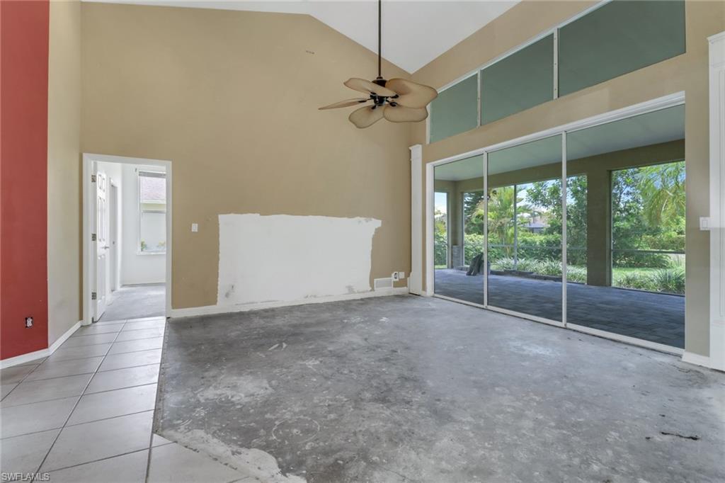 481 Raven Way Naples, FL 34110 - Photo 4 of 30 a view of a room with a large window