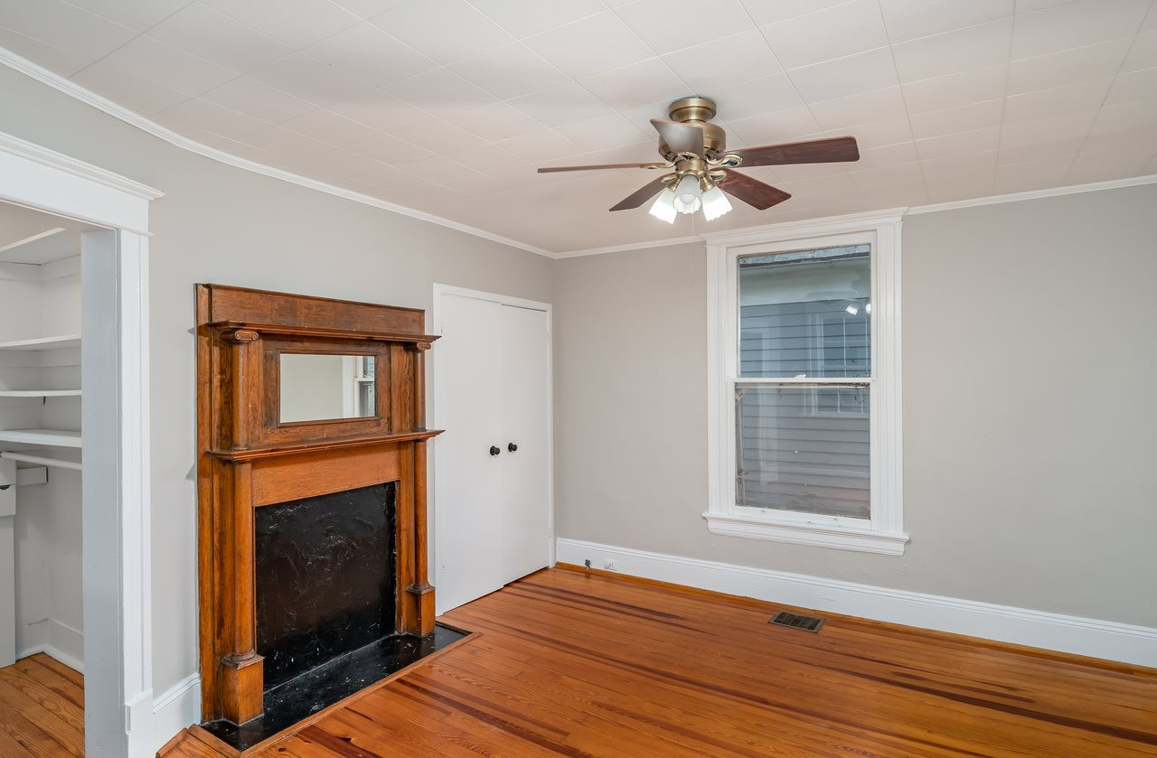 109 North Bloodworth Street Raleigh, NC 27601 - Photo 17 of 30 a view of empty room with window and fireplace