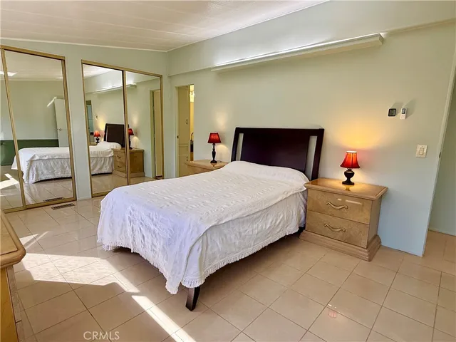 a bathroom with a toilet a sink and shower