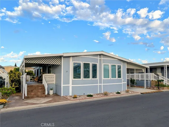 a front view of a house with a garage