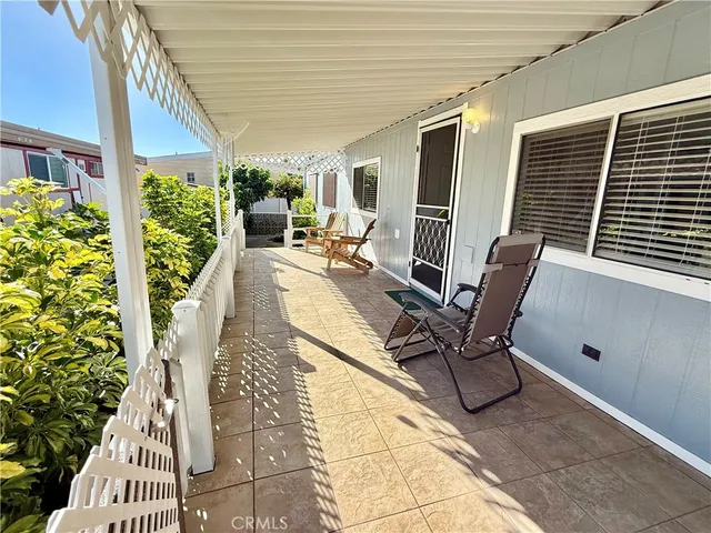 a view of outdoor space deck and wooden floor