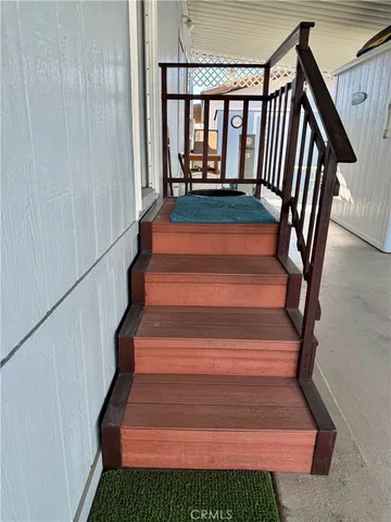 a view of a swimming pool with a chairs