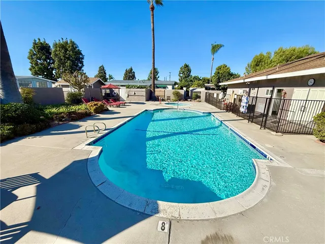 a view of a balcony with wooden floor and city view