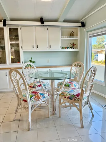 a view of a dining area with chandelier