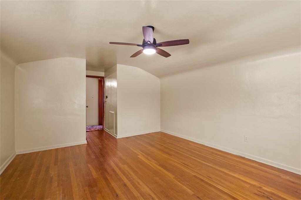 391 Golden Grove Road Baden, PA 15005 - Photo 30 of 34 a view of empty room with wooden floor
