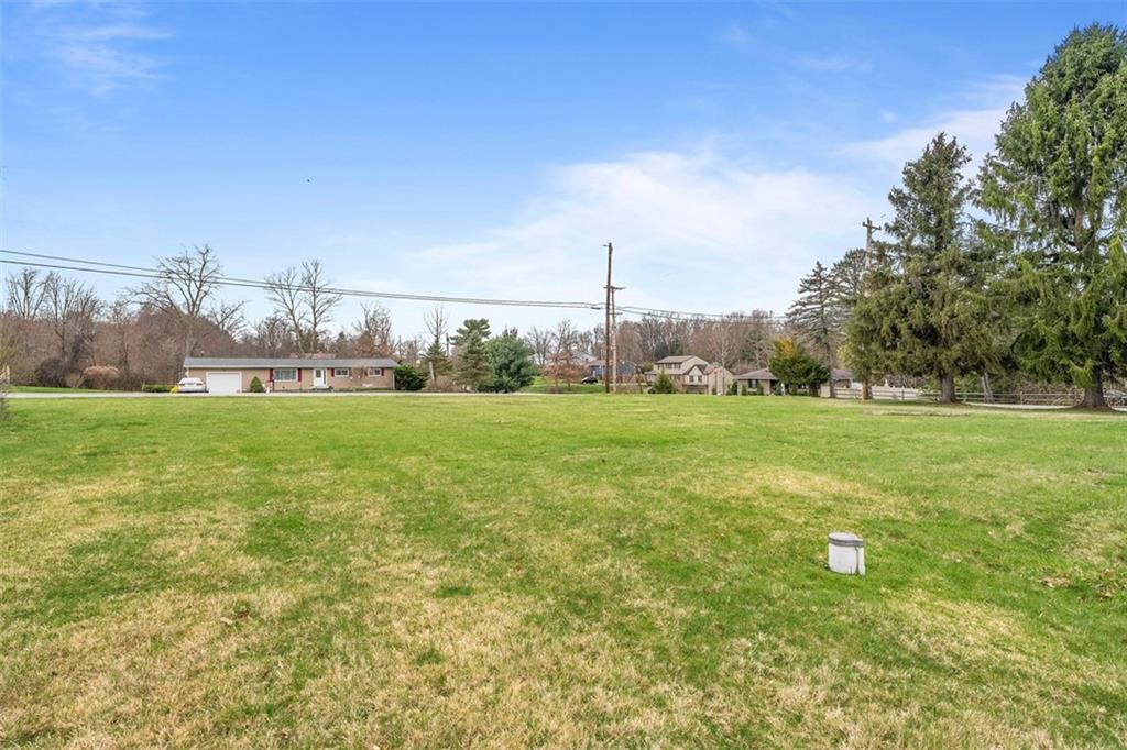 391 Golden Grove Road Baden, PA 15005 - Photo 33 of 34 a view of a green field with sitting area